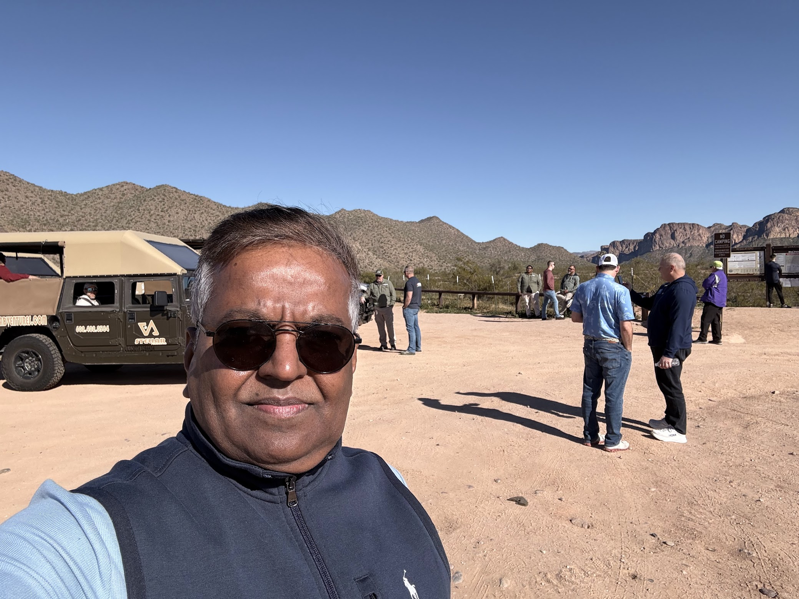 Krishna at the Desert Wild Ride activity with mountains in background